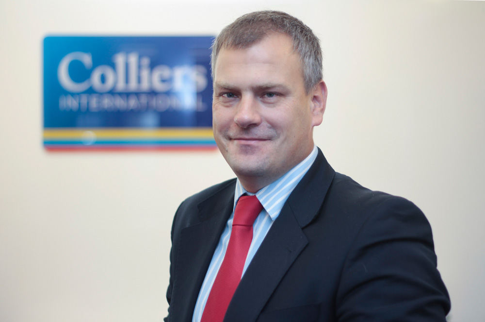 Błażej Kucharski, Regional Director w Colliers International.